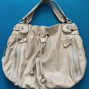 Hand or shoulder leather bag in perfect condition